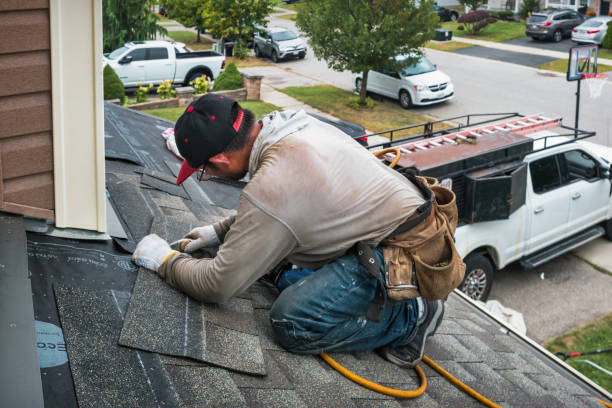 Professional Roofing technician working in Huntington Station, NY